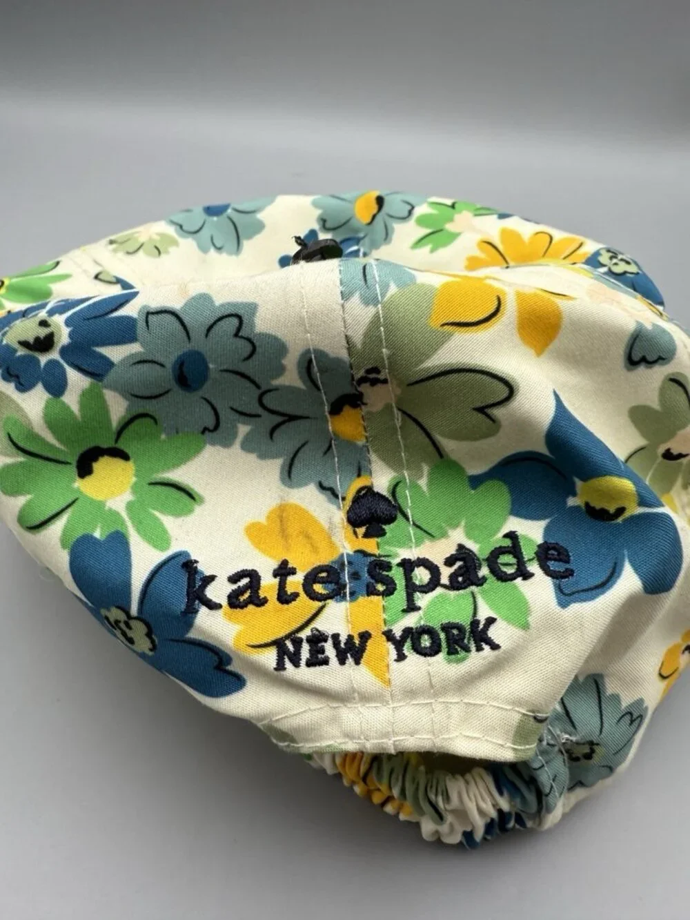 NWT Kate Spade Floral Printed Cap Hat Cream Yellow Blue Green Spade Logo
